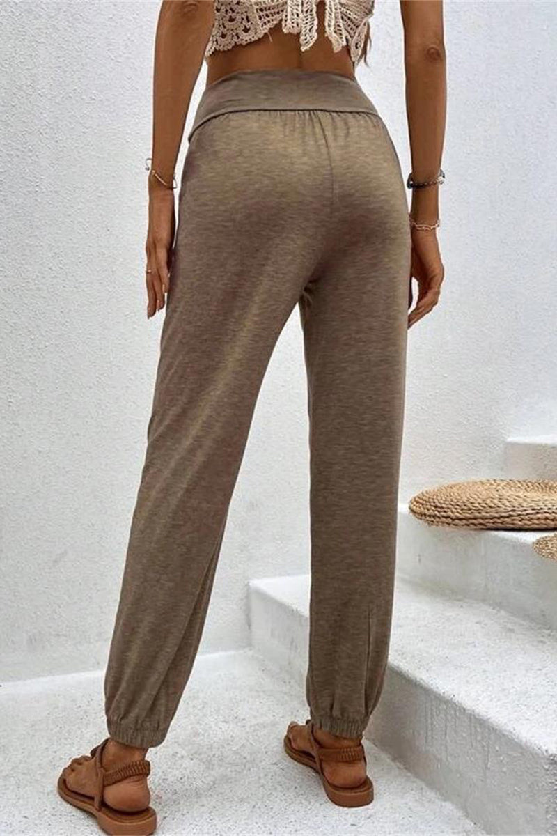 Pantalones casuales de color liso con bolsillo liso y cintura alta holgados