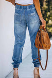 Jeans holgados con cintura ajustable y rasgados