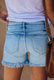 Shorts jeans liso com franjas